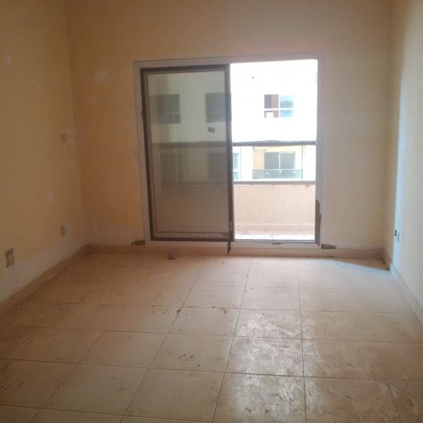 EmiratesCity-Ajman-ParadiseLakes-B6Tower-LivingRoomView3